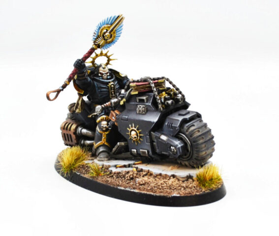 imperial-harbingers-space-marines-chaplain-on-bike-warhammer-40k-1 Imperial Harbingers Space Marines Chaplain on Bike from Warhammer 40,000, showcasing a mounted Space Marine character for a tabletop wargaming army.