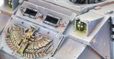 Imperial Agents Inquisition Rhino from Warhammer 40,000, showcasing a painted Imperial transport vehicle for a tabletop wargaming army.