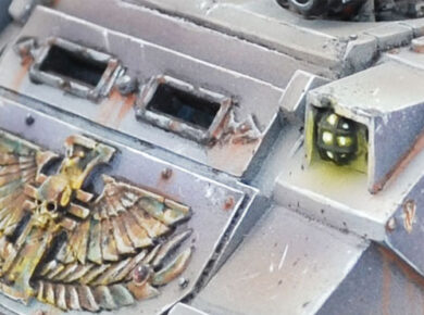Imperial Agents Inquisition Rhino from Warhammer 40,000, showcasing a painted Imperial transport vehicle for a tabletop wargaming army.