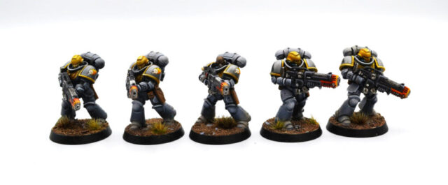 imperial-harbingers-space-marines-hellblasters-warhammer-40k-1 Imperial Harbingers Space Marines Hellblasters from Warhammer 40,000, showcasing painted plasma weapon specialists for a tabletop wargaming army.