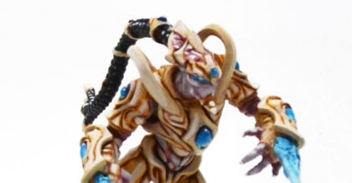 StarCraft tabletop miniature game Protoss project featuring Zealot miniatures for a sci-fi tabletop wargaming army.