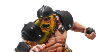 Blood Bowl V3 Necromantic Horrors Flesh Golem miniature, showcasing an undead tabletop football player from the Necromantic team