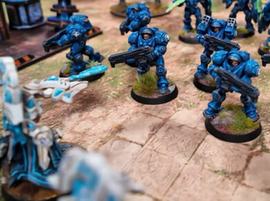 StarCraft tabletop miniature game battle report featuring Terran forces battling Protoss forces in an intense strategic tabletop wargame.