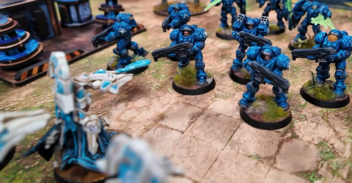 StarCraft tabletop miniature game battle report featuring Terran forces battling Protoss forces in an intense strategic tabletop wargame.