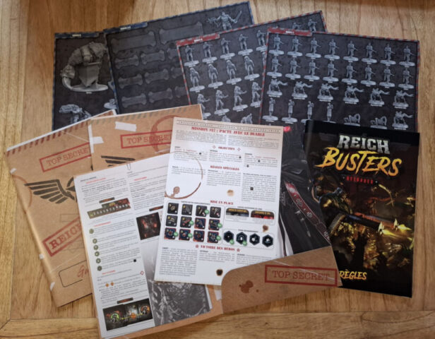 Reichbusters Reloaded unboxing showing the box contents and miniatures